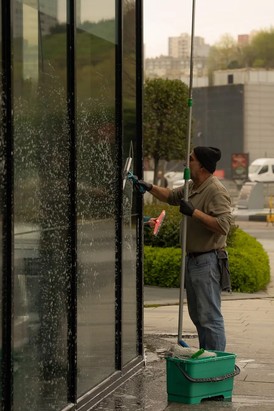 Professional glass cleaning with a squeegee